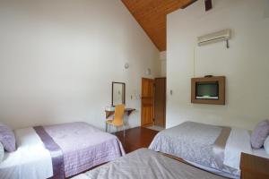 Voodi või voodid majutusasutuse Music House Homestay toas