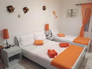 A bed or beds in a room at Drouga's Studios & Suites Astypalaia Greece