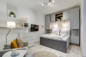 Posteľ alebo postele v izbe v ubytovaní Riverside Deluxe Apartment