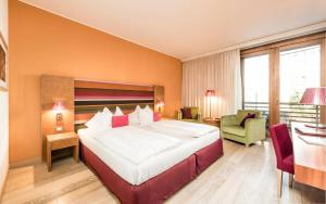Postel nebo postele na pokoji v ubytování Hotel Therme Meran - Terme Merano
