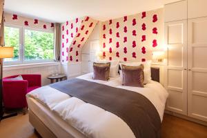 Letto o letti in una camera di Waldhotel Stuttgart
