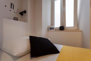 Posteľ alebo postele v izbe v ubytovaní Guest House Blue