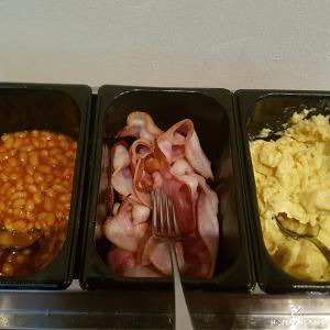 three plastic containers of food with a fork and beans at Ancares in Balboa