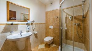 Koupelna v ubytování Hotel Tevel