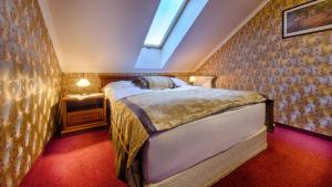 Postel nebo postele na pokoji v ubytování Hotel Tevel