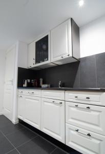 Kjøkken eller kjøkkenkrok på B&B Bed & Sauna