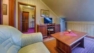 TV a/nebo společenská místnost v ubytování Hotel Tevel