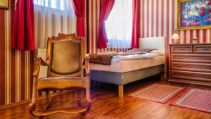 Postel nebo postele na pokoji v ubytování Hotel Tevel
