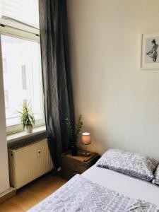 Una cama o camas en una habitación de Oskars Absteige