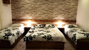 Ліжко або ліжка в номері Paradise Rabab Apartment & Guesthouse
