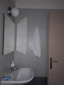 Kylpyhuone majoituspaikassa ZAGA Apartments