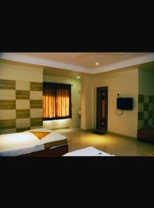 Gallery image of Hotel Apple Sai Residency in Shirdi