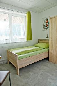 Voodi või voodid majutusasutuse Pension Waldesruh toas
