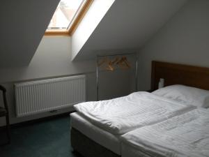 Postel nebo postele na pokoji v ubytování Apartmán Lednice