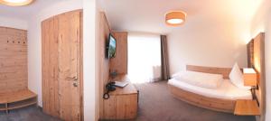 Una cama o camas en una habitación de Hotel Birkenhof