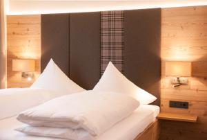 
Ein Bett oder Betten in einem Zimmer der Unterkunft Hotel Birkenhof
