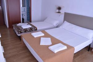 Posteľ alebo postele v izbe v ubytovaní ArArAt Hostel