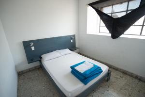 Voodi või voodid majutusasutuse El Petate Hostel toas