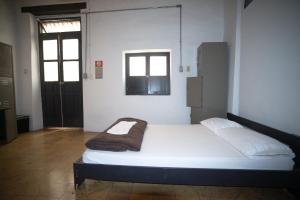 Postel nebo postele na pokoji v ubytování El Petate Hostel
