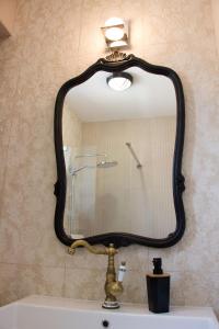 Koupelna v ubytování By The Sea