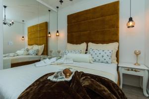Posteľ alebo postele v izbe v ubytovaní Francesca Baroque Apartment