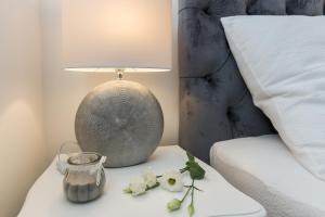 Posteľ alebo postele v izbe v ubytovaní Francesca Baroque Apartment