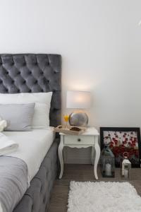 Posteľ alebo postele v izbe v ubytovaní Francesca Baroque Apartment
