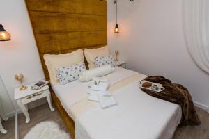 Posteľ alebo postele v izbe v ubytovaní Francesca Baroque Apartment