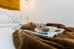 Posteľ alebo postele v izbe v ubytovaní Francesca Baroque Apartment