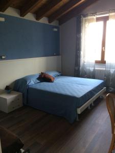 מיטה או מיטות בחדר ב-B&b la valletta