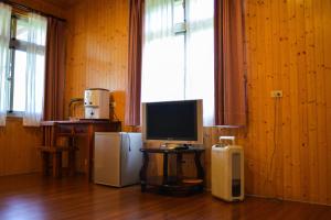 Televiisor ja/või meelelahutuskeskus majutusasutuses Taroko Sialin Coffee Farm Homestay