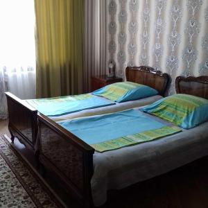 Postel nebo postele na pokoji v ubytování Hotel family hotel
