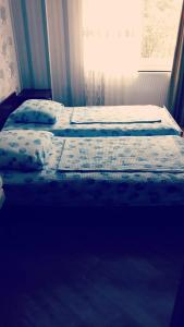 Postel nebo postele na pokoji v ubytování Hotel family hotel