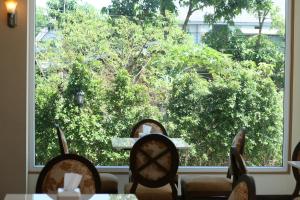 Κήπος έξω από το Kitlada Hotel Udonthani
