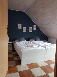 Postel nebo postele na pokoji v ubytování Niewinne domki - Alentejo