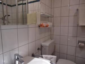 Kúpeľňa v ubytovaní Zimmer und Ferienwohnungen "Heidis Welt" Podlanig