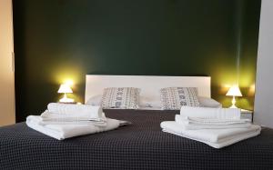 Een bed of bedden in een kamer bij Milano Navigli Apartment - Via Savona