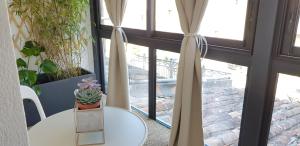 A balcony or terrace at Le Particulier - Appart Hotel