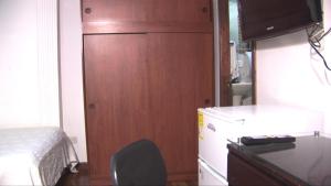 Kuchyň nebo kuchyňský kout v ubytování Hotel Apartasuite Normandia + 37 fotografií