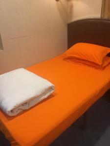 Voodi või voodid majutusasutuse Kowloon YOUTH Village Tsim Sha Tsui 九龙青年公寓 toas