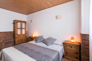 Кровать или кровати в номере El Castillo de Celia