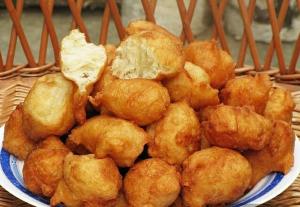 a plate of fried food on a table at Apartman Pavle Virpazar in Virpazar