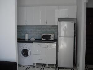 Η κουζίνα ή μικρή κουζίνα στο Batumi Boutique Apartment
