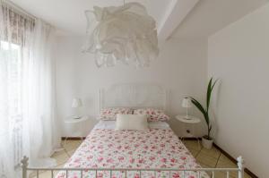 Ένα ή περισσότερα κρεβάτια σε δωμάτιο στο Casa Marisa