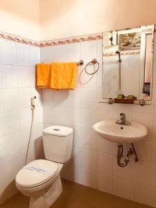 Koupelna v ubytování Nam Long Hotel