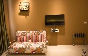 TV a/nebo společenská místnost v ubytování NEAR B&B