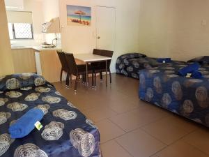 Mango Tree Motel tesisinde bir oturma alanı