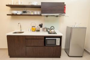 Kuchyň nebo kuchyňský kout v ubytování Fahrenheit Suites Bukit Bintang, Kuala Lumpur