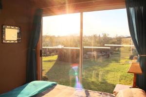 Кровать или кровати в номере The Wild Farm Backpackers