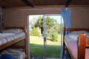 Кровать или кровати в номере The Wild Farm Backpackers
